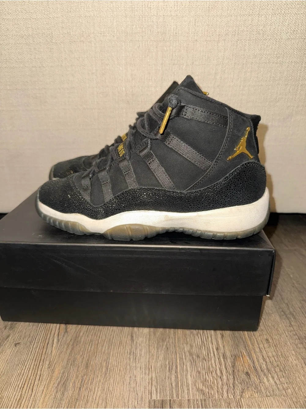 Jordan Black with Gold Accent High-Top Sneakers